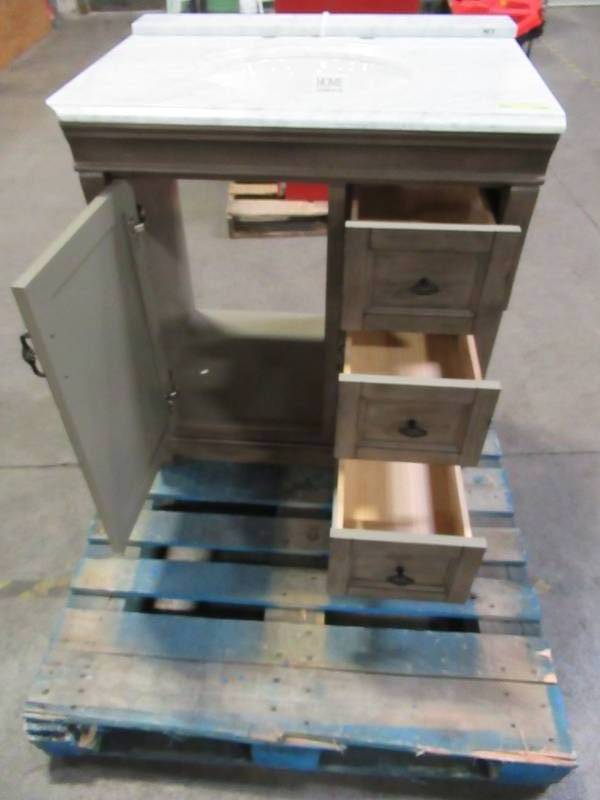 lot 215 image: Home Decorators Collection Naples 31 in. W x 22 in. D Bath Vanity in Distressed Grey with Left Drawers and Marble Vanity Top in Carrara White - LH Front Top Corner Cracked.