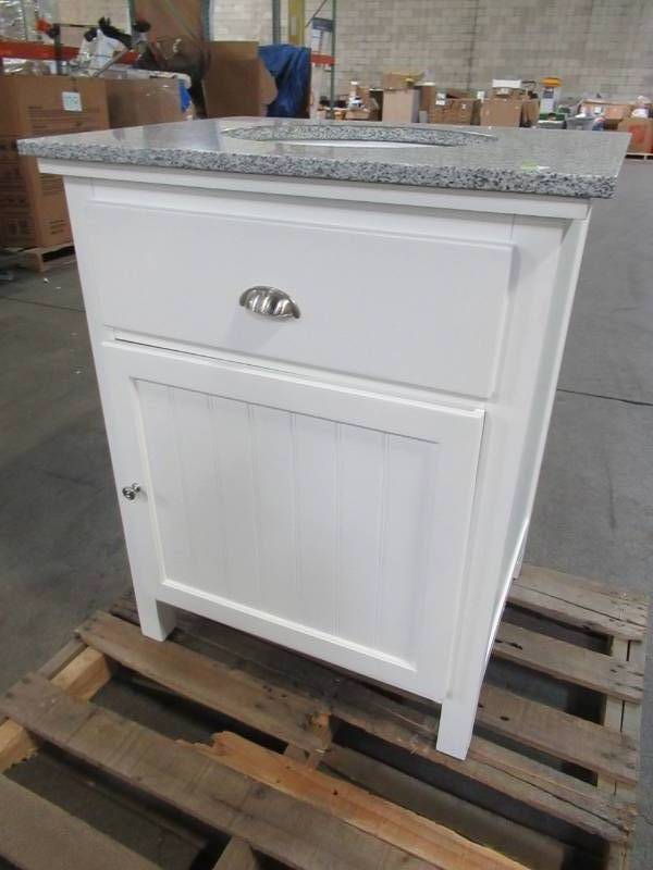lot 218 image: Home Decorators Collection. Ridgemore 28 in. W x 22 in. D Vanity in White with Granite Vanity Top in Grey with White Sink - Back is cracked.