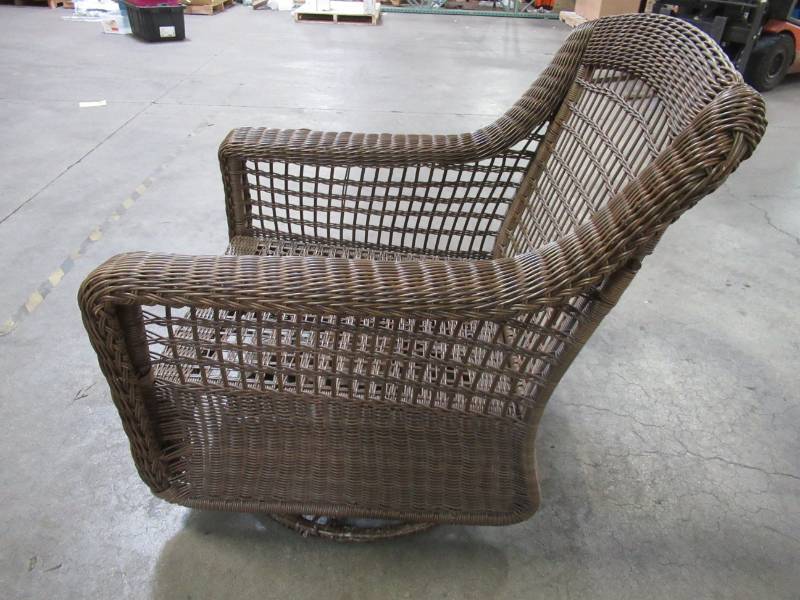 lot 228 image: Hampton Bay Park Meadows Brown Swivel Rocking Wicker Outdoor Lounge Chair with Cushion 65-214544 - SWIVELROCKER BASE NEEDS WORK