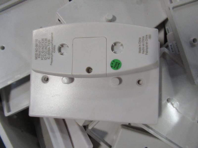 lot 834 image: WHOLESALE MIXED BIN OF MISCELLANEOUS CEILING FAN REMOTES AND WALL STORAGE PLATES