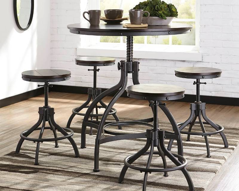 lot 239 image: Signature Design By Ashley Odium Counter Height Dining Room Table and Bar Stools (5 Piece Set). D284-223