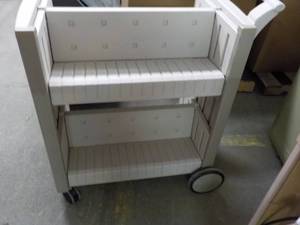lot 112 image: Double sided Resin shelving unit on...