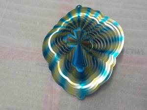 lot 122 image: Multi-colored metal cross spinner...