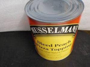lot 176 image: 7 lb. 2 oz. can Musselmans diced p...