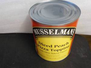 lot 177 image: 7 lb. 2 oz. can Musselmans diced p...