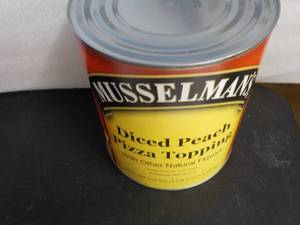 lot 179 image: 7 lb. 2 oz. can Musselmans diced p...