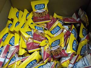 lot 241 image: case of 104 bags gold Rold heartzel...