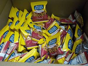 lot 242 image: case of 104 bags gold Rold heartzel...
