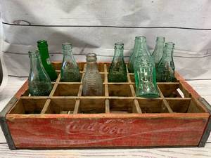 lot 12 image: Antique CocaCola Wood Crate With Vintage Bottles