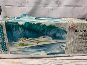 lot 20 image: Radio Shack Radio Controlled Racing Boat 60-4240