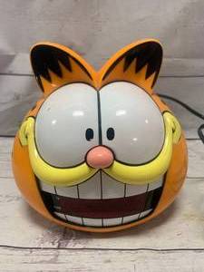 lot 43 image: Vintage 1991 Sunbeam Garfield Head Digital Alarm Clock