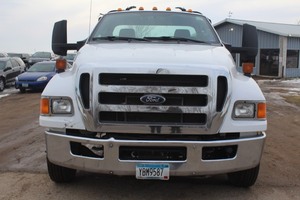 lot 6606 image: 2015 Ford F650 Roll-Off Tow Truck w Wheel Lift - V10 Gas - Century Bed - DewEze Hydraulics - NEW ENGINE 2017 -