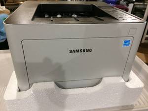 lot 14 image: SAMSUNG SLM4020ND ProXpress SL-M4020NDBMA Monochrome Laser Printer - Like New Condition In Original Box However Needs Ink
