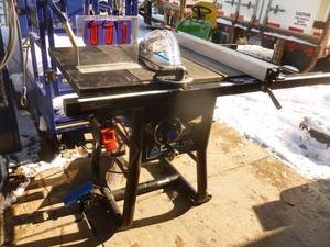lot 1 image: Delta 10 Table saw. Appears lightly used with fence & miter. Tested & works. As shown.