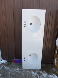 lot 3 image: Double vanity top. 60 x 20. Appears to be new. Missing shipping crate. As shown.