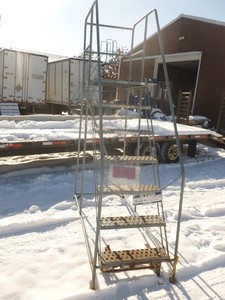 lot 6 image: 6 Cotterman rolling ladder. Good used condition. As shown.