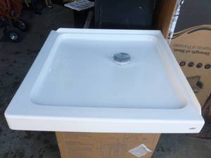 lot 17 image: American standard shower base. Appears new in box. As shown.