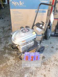 lot 21 image: Briggs & Straton 2200 psi pressure washer. Fires on ether but unable to fully test. No hose or wand. As shown.