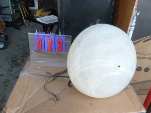 lot 23 image: Hanging light fixture. Appears to be a display model. As shown.