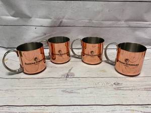 lot 59 image: 4 Russian Standard Moscow Mule Cups (set of 5 sold for $49 on Ebay)