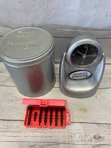 lot 63 image: Craftsman Bit Set & North Dakota Pendulum Clock