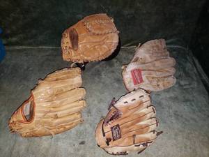lot 28 image: Left Handed Baseball Gloves & Catchers Mitt