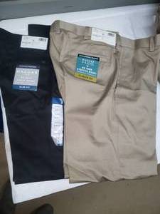lot 94 image: 2 Pair of Haggar No Iron Khaki Pants 34 x 30, New
