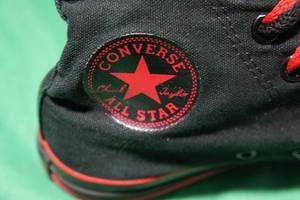 lot 84 image: Converse All-Star Chuck Taylors Black & Red High Top - Mens 7 or Womens 9