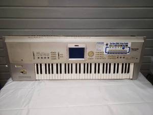 lot 10 image: Korg Triton Studio 61 Keyboard Synthesizer