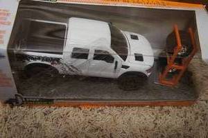 lot 243 image: 2011 Ford F-150 SVT Raptor Die-Cast Metal & 62 Chevy Vette
