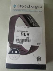 lot 4 image: FitBit Charge $ open box...