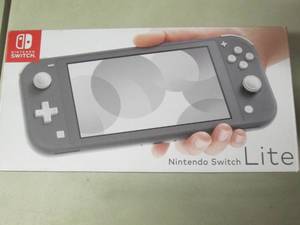 lot 5 image: Nintendo Switch Lite open box...