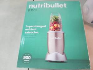 lot 64 image: Nutribullet Pro open box Retail $13...