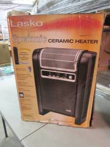 lot 69 image: Lasko Cyclonic Ceramic Heater open ...