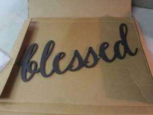 lot 92 image: Blessed Sign needs repair...
