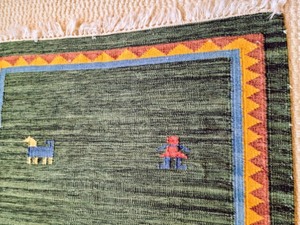 lot 28 image: Woven Accent Rug