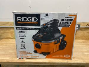 lot 7 image: RIGID 4 Gal. 5.0-Peak HP Portable WetDry Shop Vacuum with Filter, Hose and Accessories