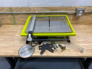 lot 26 image: RYOBI 7 in. 4.8 Amp Tabletop Tile Saw