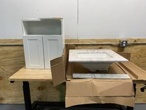 lot 71 image: Bathroom Sink and Cabinet Combo Lot