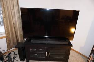Toshiba 55 TV  A Box Surround Bar  Black Cabinet  Toshiba VCR-DVD Player