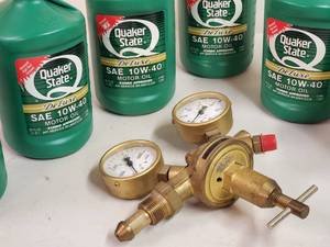 lot 20 image: Air Compressor Valve & 6 Qts 10W-40 Motor Oil