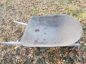 lot 148 image: Wheel Barrel looks old, still very usable