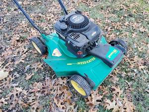 lot 150 image: Lawn Mower by Weed Eater
