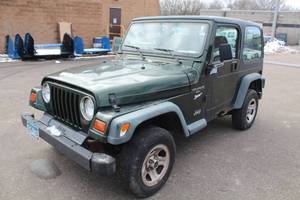 lot 9 image: 1997 Jeep Wrangler 4.0L Sport 2-Door Open Body Wagon