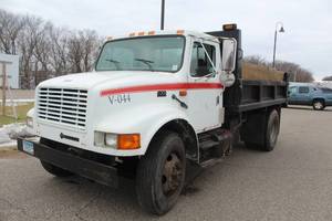 lot 4 image: 1996 Navistar International 4900 80 Inch Wide Steel Cab 68 ABC Dump Truck