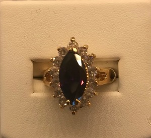 lot 14 image: Purple Marquise, with 14 Clear Stones Fashion Ring - Size 10
