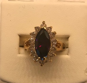 lot 12 image: Purple Marquise, with 14 Clear Stones Fashion Ring - Size 8