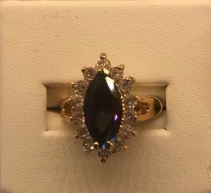 lot 13 image: Purple Marquise, with 14 Clear Stones Fashion Ring - Size 9