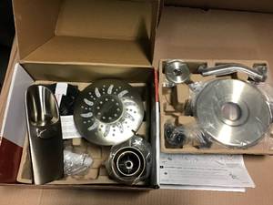 lot 13 image: Brea Single-Handle 3-Spray Tub and Shower Faucet in Brushed Nickel with Waterfall Spout (Valve Included) &nbspin good condition 