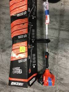 lot 20 image: 21.2 cc Gas 2-Stroke Cycle Curve Shaft Trimmer by ECHO &nbspin good condition 